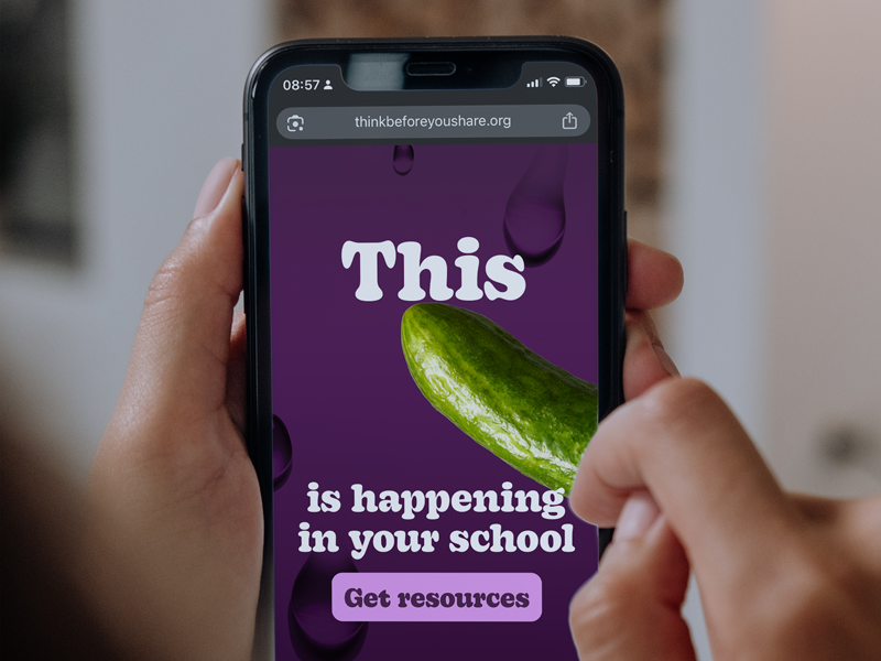 An image of someone holding a smart phone displaying a Think Before You Share campaign video