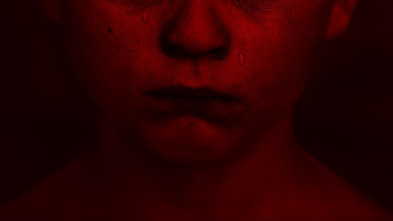 Sad child red filter