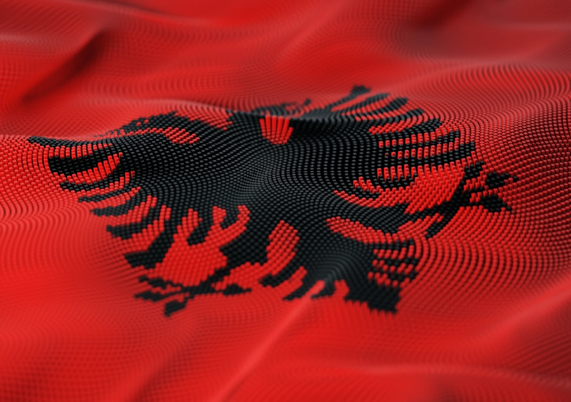 Albanian flag with a black double-headed eagle on a red background, rendered in a textured 3D pattern