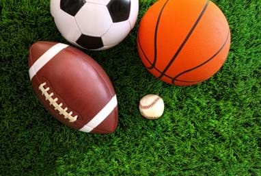 Rugby, football, basketball and baseball balls
