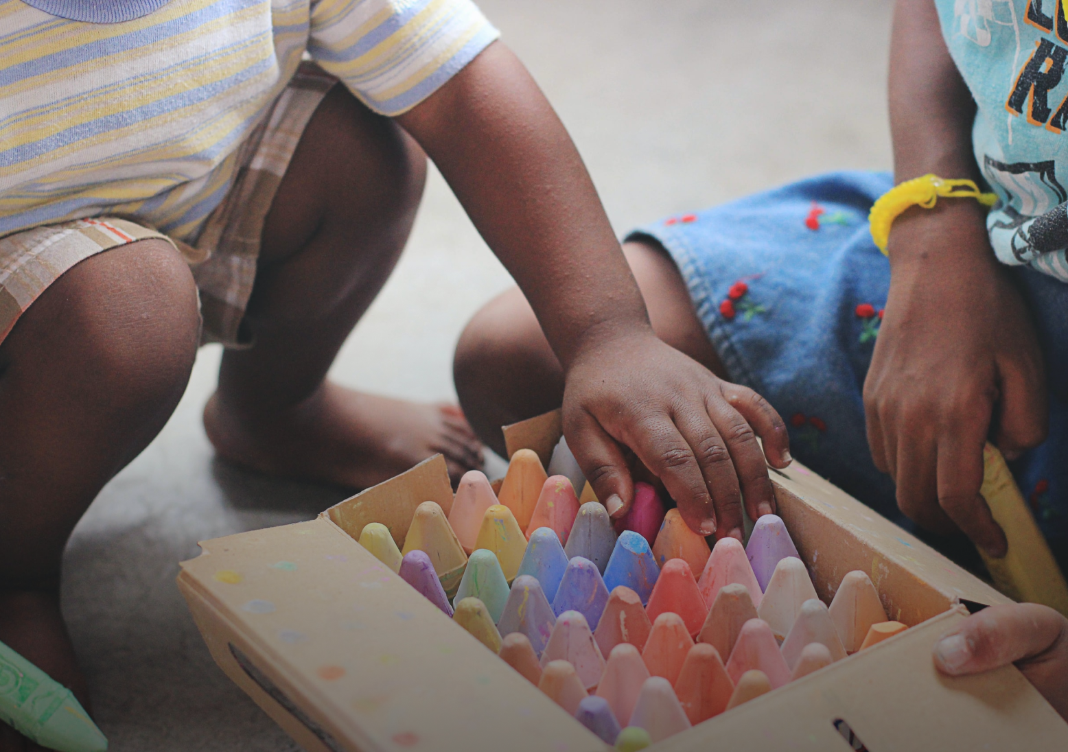 Two children with crayons