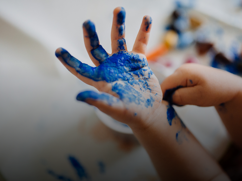 Child with painted hands