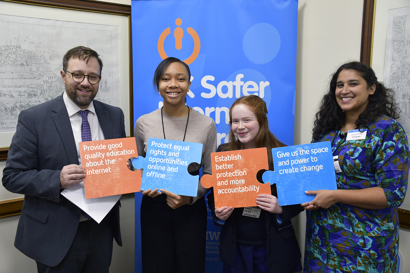 Chris Elmore MP,  UKSIC member and two children on Safer Internet Day