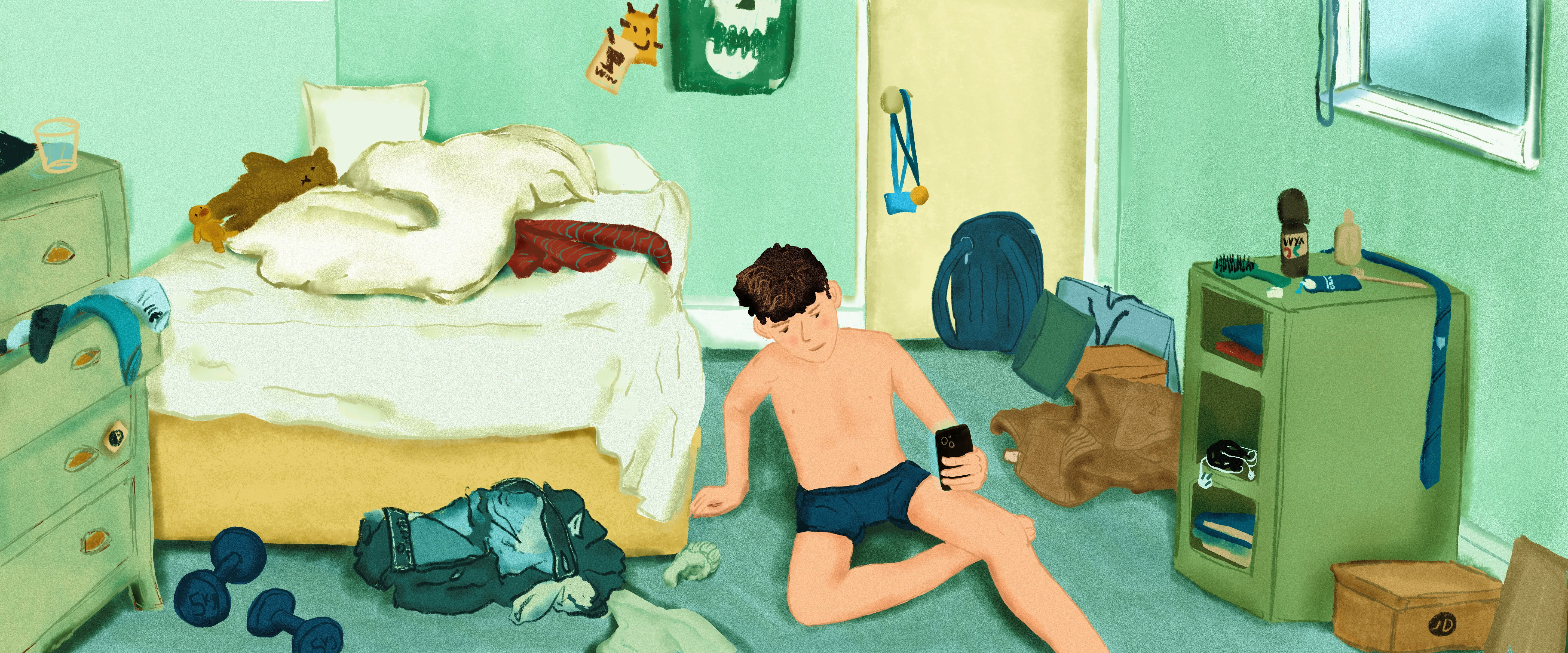 Boy in underwear on bedroom floor, taking photos of himself with a mobile phone. 