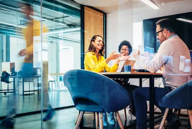 people talking in an office environment 