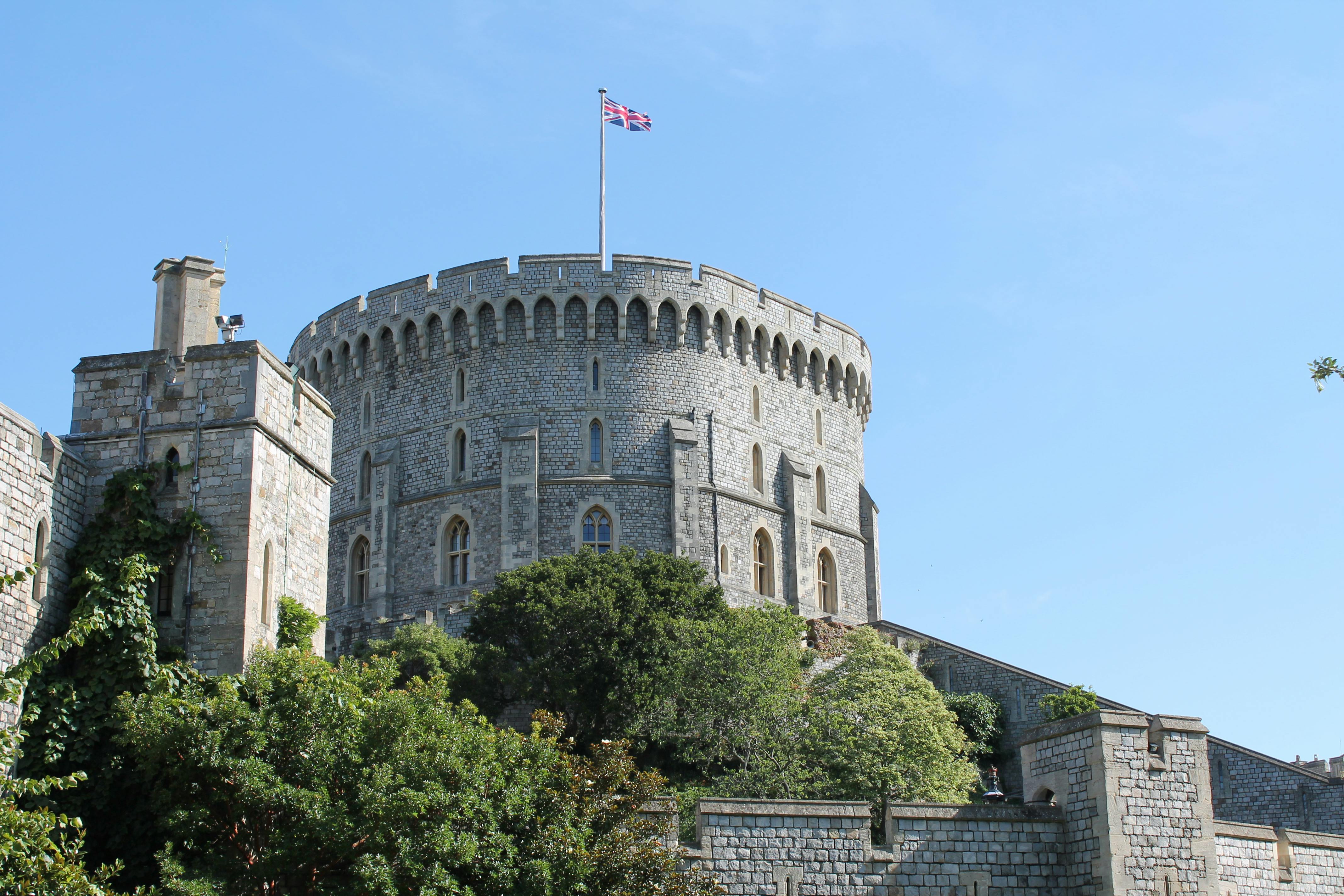 Windsor Castle With Flag on Top Under Blue Sky