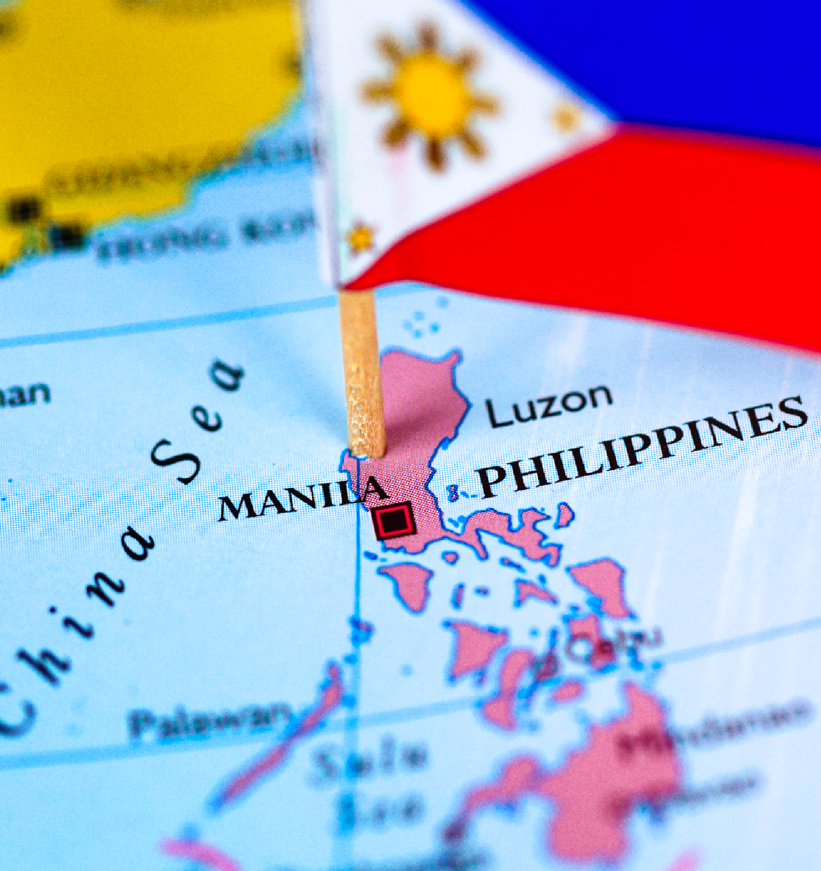 Map of the Philippines with a Filipino flag marking Manila, the location of IWF's satellite event