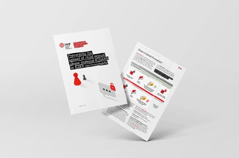 Two printed pages of an IWF guidance document are displayed against a light grey background, one showing the cover and the other showing an inside spread with illustrations and text about preventing harmful content in end‑to‑end encrypted environments.